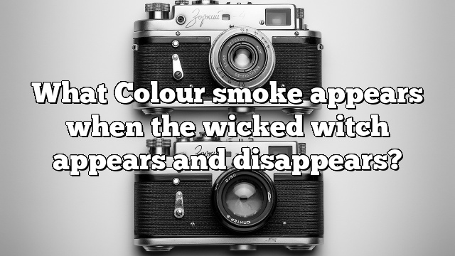 What Colour smoke appears when the wicked witch appears and disappears?